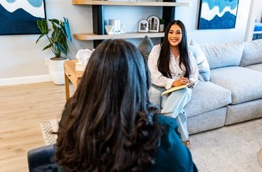 A client sharing openly with Tania during an individual therapy session