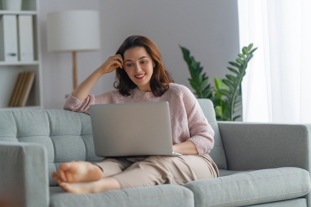 Client attending a secure telehealth therapy session from home