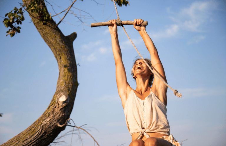 Woman experiencing freedom and renewed joy after trauma therapy